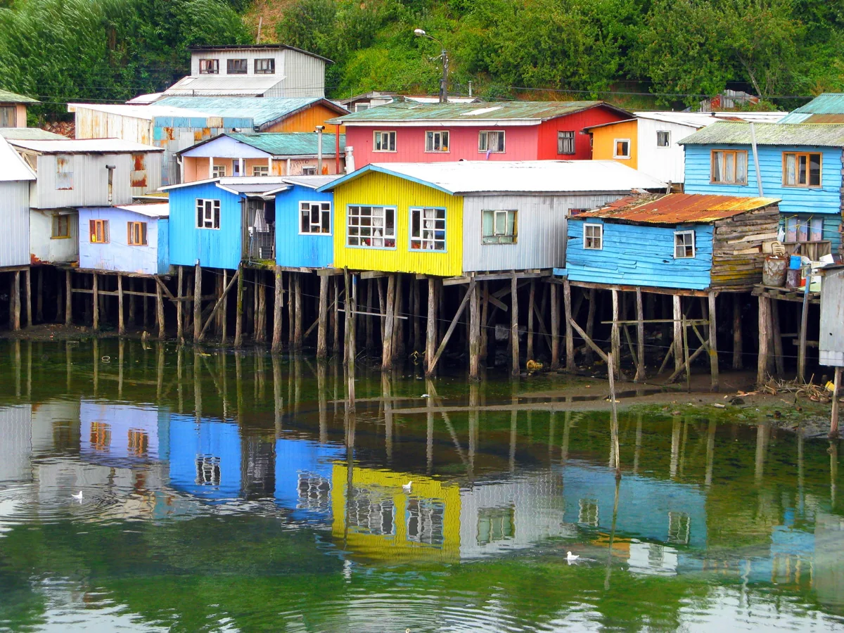 Castro stilt houses reflected in the water, archive photograph from 2008